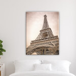 Tableau tour Eiffel vintage. Bonne qualité, original, accrochée sur un mur au dessus d'un canapé dans un salon