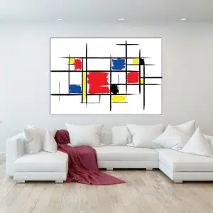 Tableau Mondrian Composition Désinvolte. Bonne qualité, original, accrochée sur un mur au dessus d'un canapé dans un salon