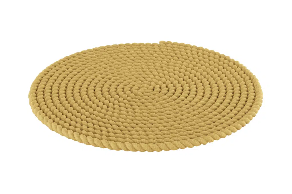 devant un fond blanc, un tapis en cordage est posé. La corde est enroulée comme un rond, à plat.