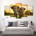 Tableau africain éléphants dans la jungle. Bonne qualité, original, accrochée sur un mur au dessus d'un canapé dans un salon