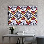 Tableau africain motif géométrique. Bonne qualité, original, accrohée sur un mur au dessus d'une table dans une maison
