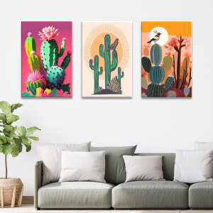 Tableau Mexique cactus pop art accroché dans un salon au-dessus d'un canapé bas dans les tons gris avec coussins blancs et plante verte à côté